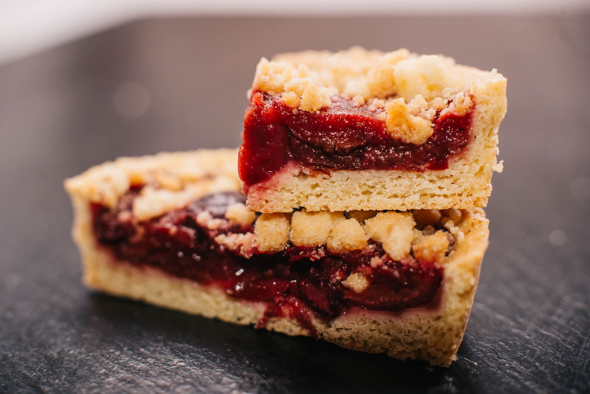 close up of delicious cherry crumble bars
